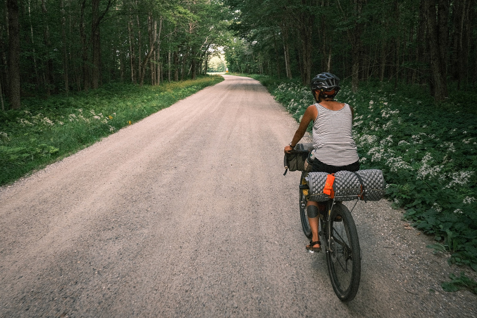 A person riding their bike for 100 miles while wearing Bedrock Sandals