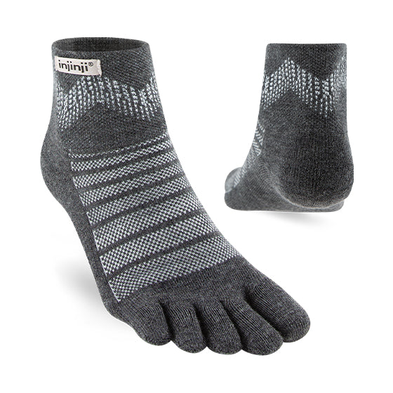 A pair of Injinji Merino wool midweight mini-crew socks in gray color with toe separation.