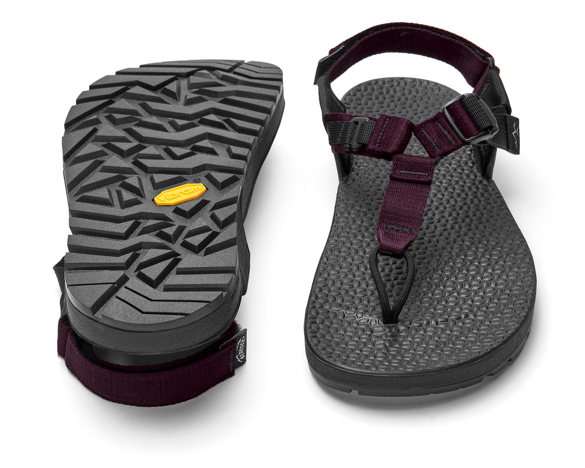 A pair of Cairn Evo 3D sandals with burgundy straps and a rugged black vibram Evo XS Trek sole.