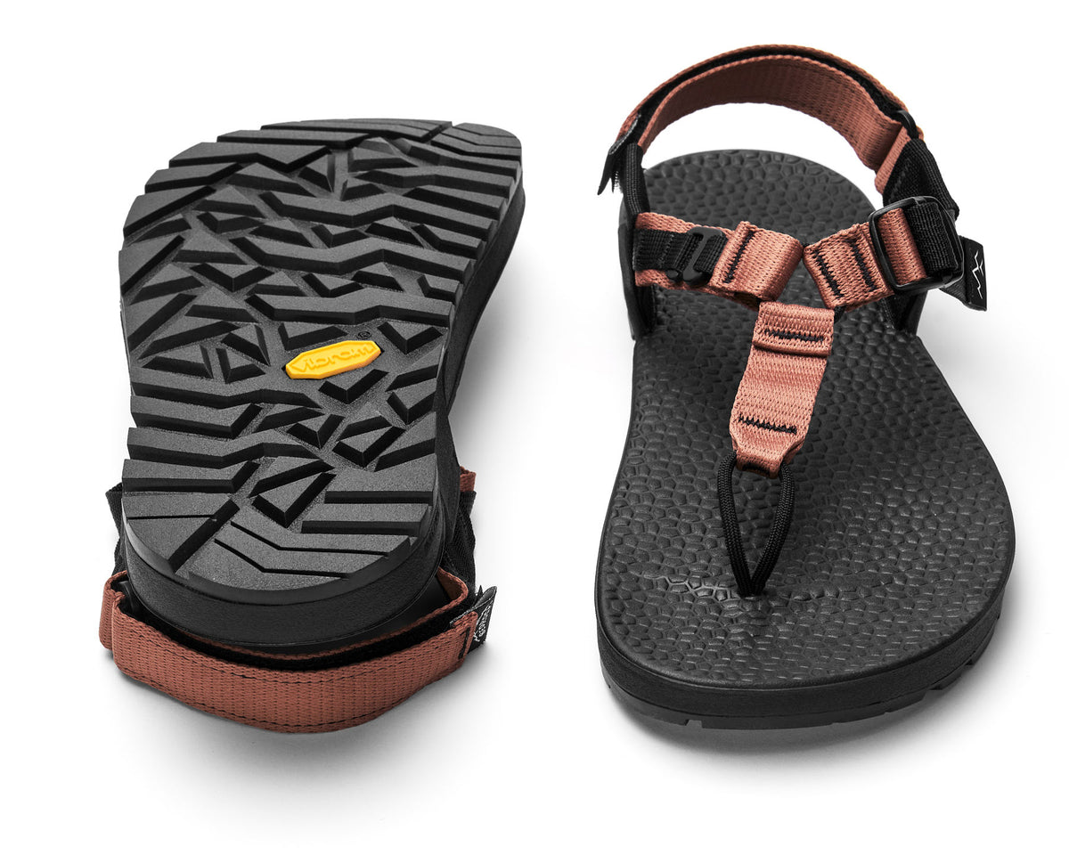 A pair of Cairn Evo 3D sandals with clay straps and a rugged black vibram Evo XS Trek sole.