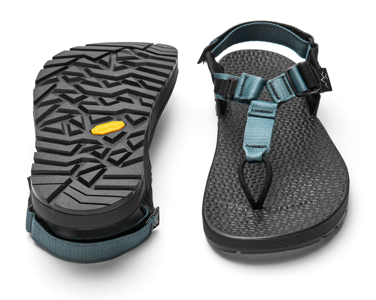 A pair of Cairn Evo 3D sandals with slate blue straps and a rugged black vibram Evo XS Trek sole.
