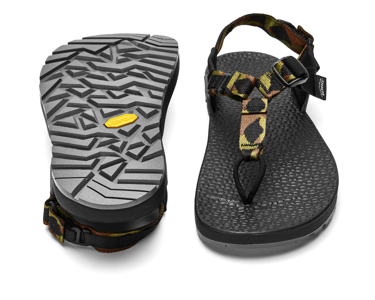 A pair of Cairn Evo 3D PRO sandals with block landscape patterned straps, featuring a gray rugged Megagrip vibram sole.