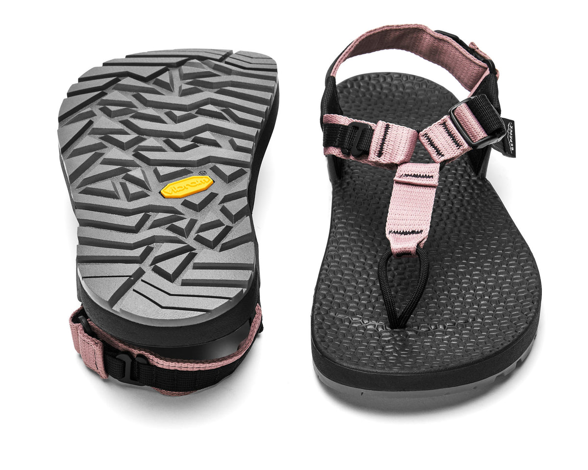 A pair of Cairn Evo 3D PRO sandals with mauve pink straps, featuring a gray rugged Megagrip vibram sole.