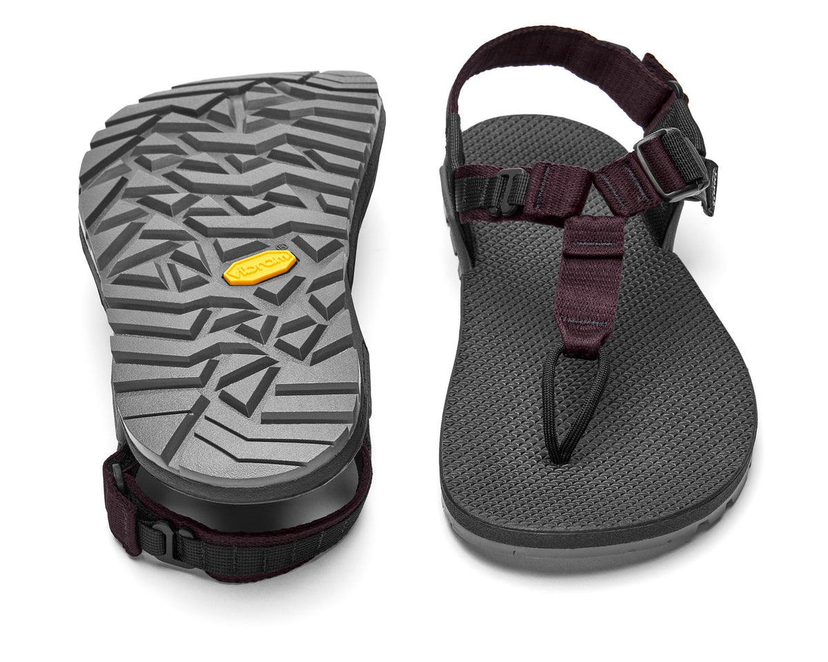 A pair of Cairn Evo PRO Sandals with burgundy straps and black footbed, featuring a hook-and-loop strap design and Vibram Megarip outsole.