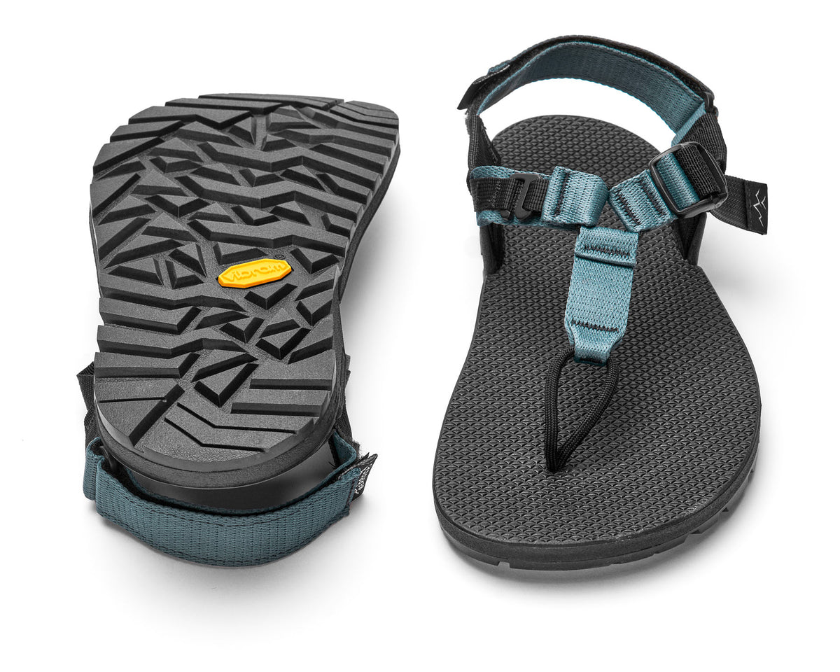 A pair of Cairn Evo Sandals with slate blue straps and rugged Vibram XS Trek Evo sole.
