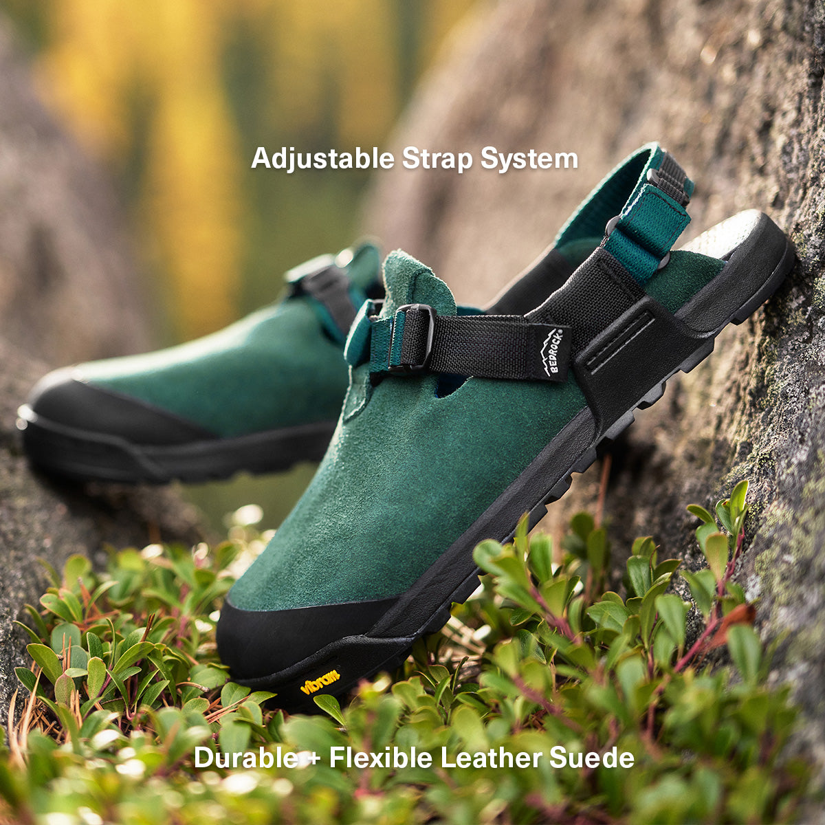 Cascade Green Mountain Clogs with adjustable straps on a natural background. Featuring an adjustable strap system and durable + flexible leather suede.