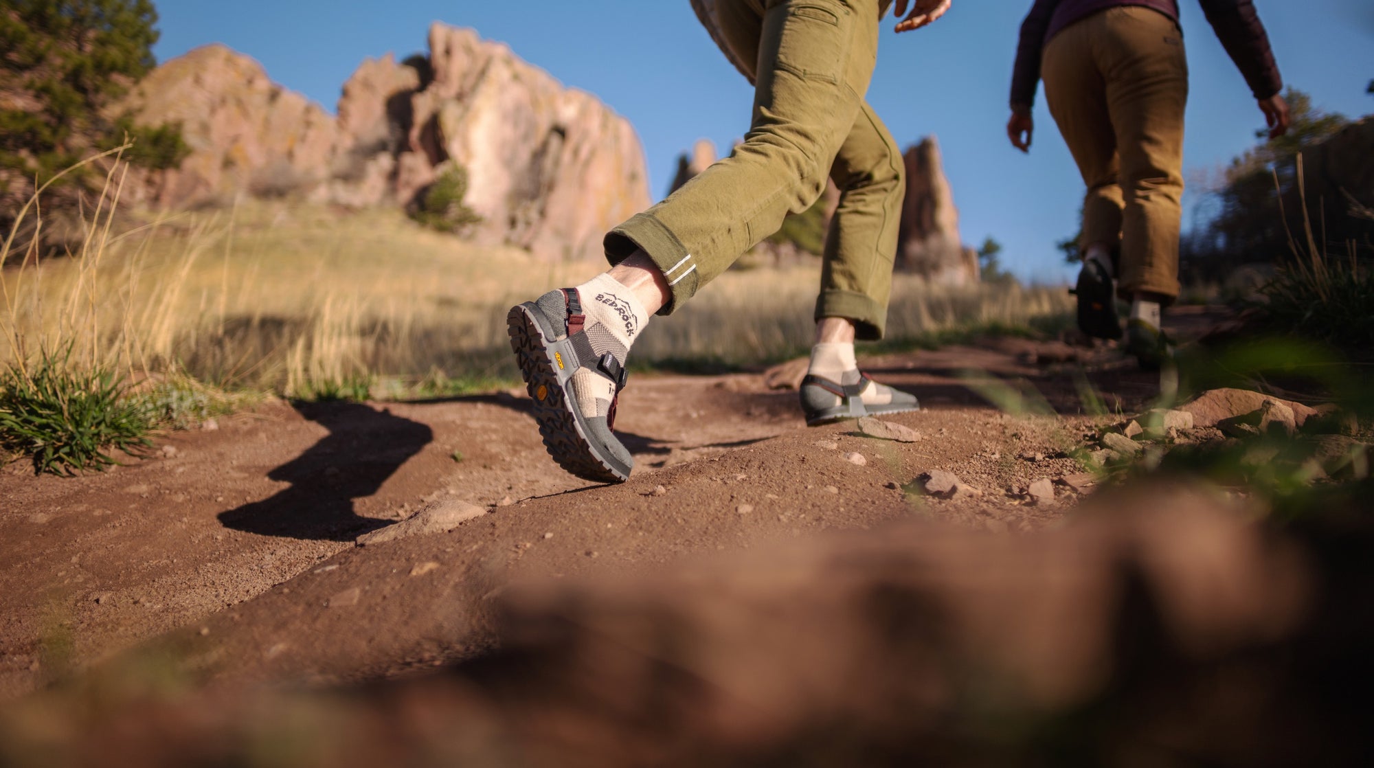 Two hikers wearing Bedrock Sandals and Split Toe Socks