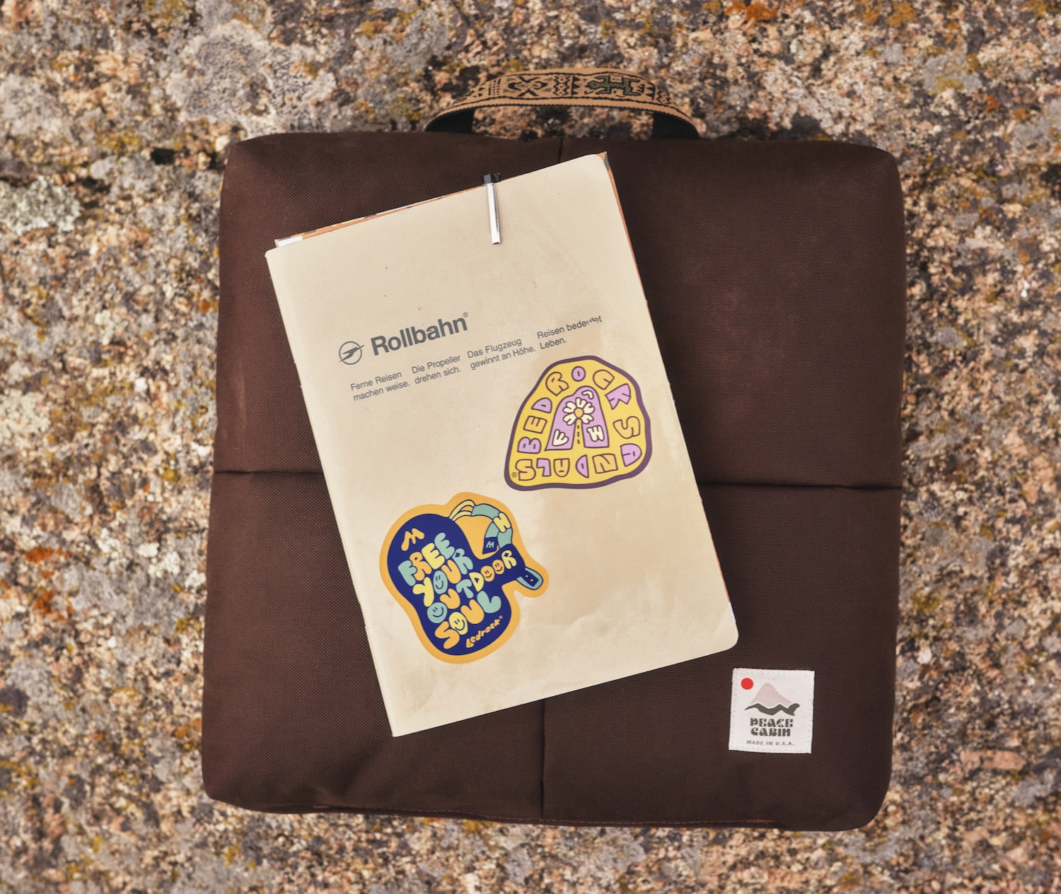 Bedrock die cut stickers stuck on a notebook cover
