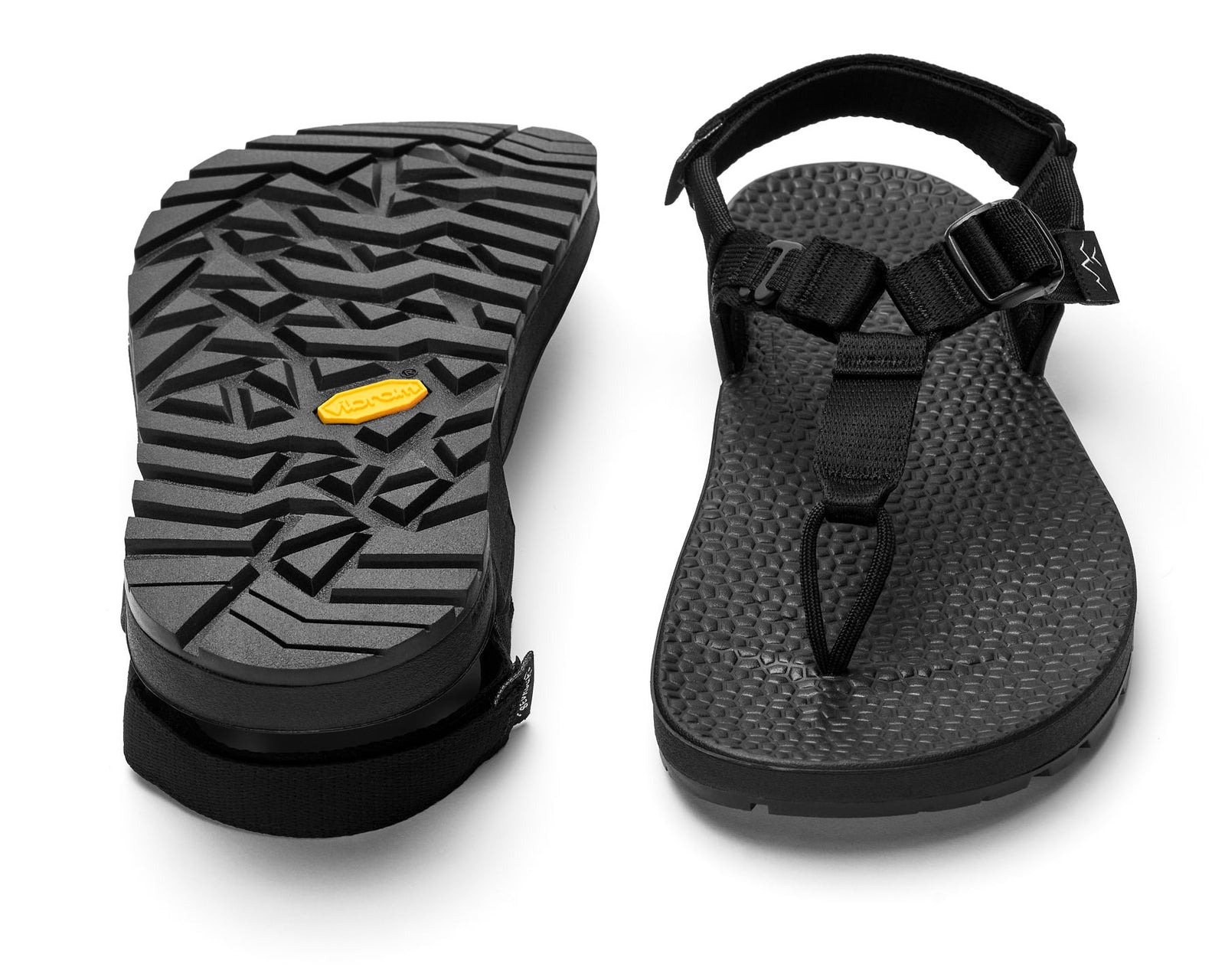 A pair of Cairn Evo 3D sandals with black straps and a rugged black vibram Evo XS Trek sole.