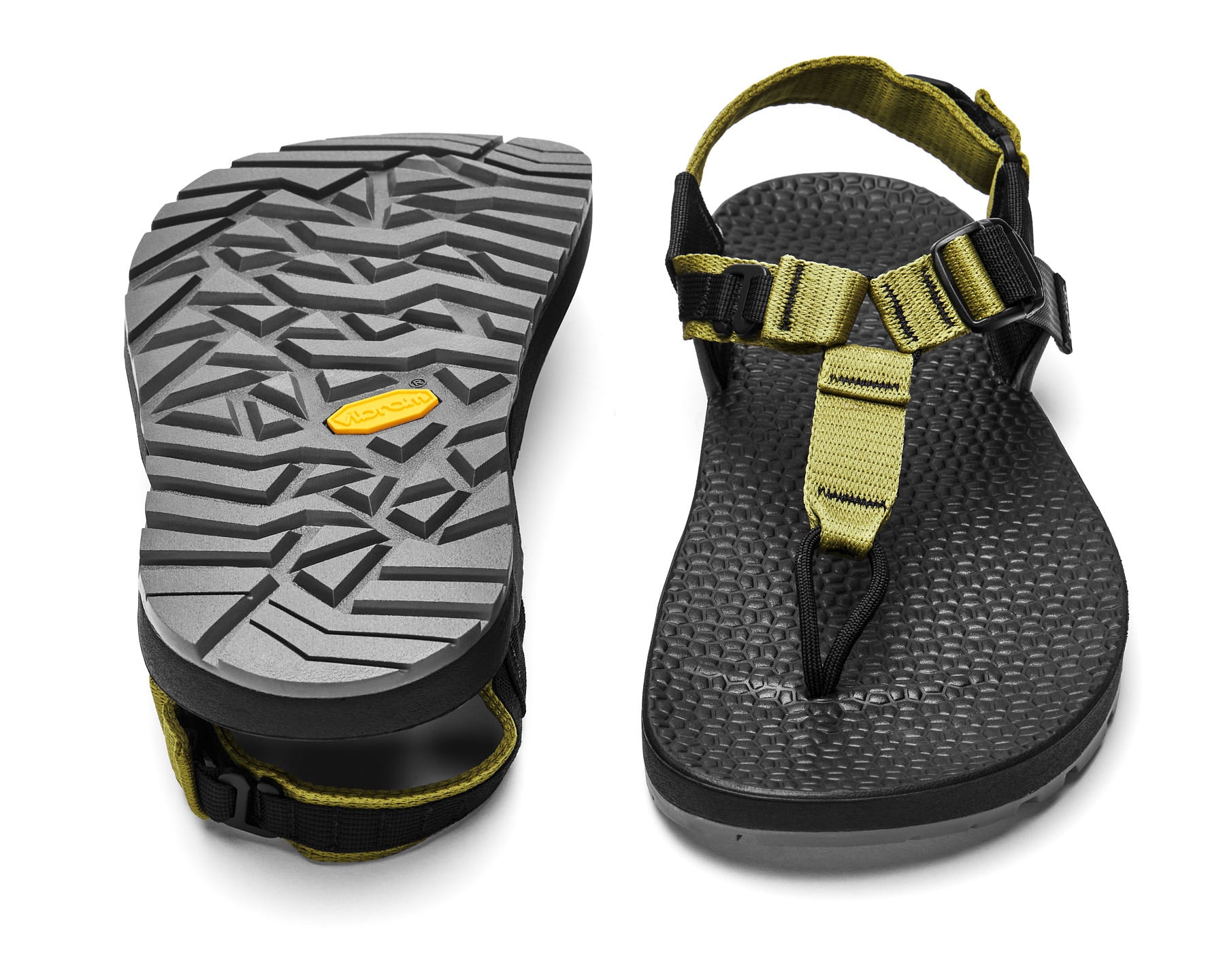 A pair of Cairn Evo 3D PRO sandals with green straps, featuring a gray rugged Megagrip vibram sole.