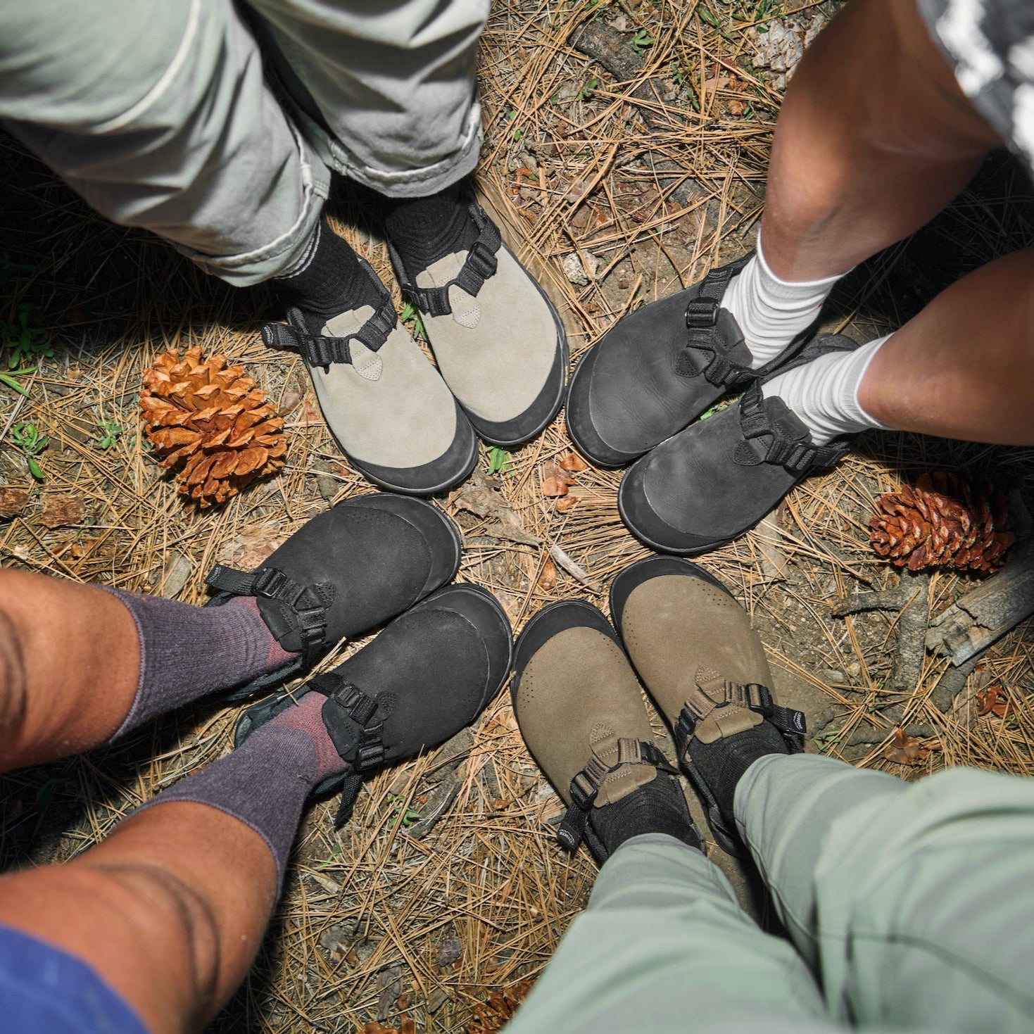 POV of 4 people wearing Bedrock Mountain Clogs