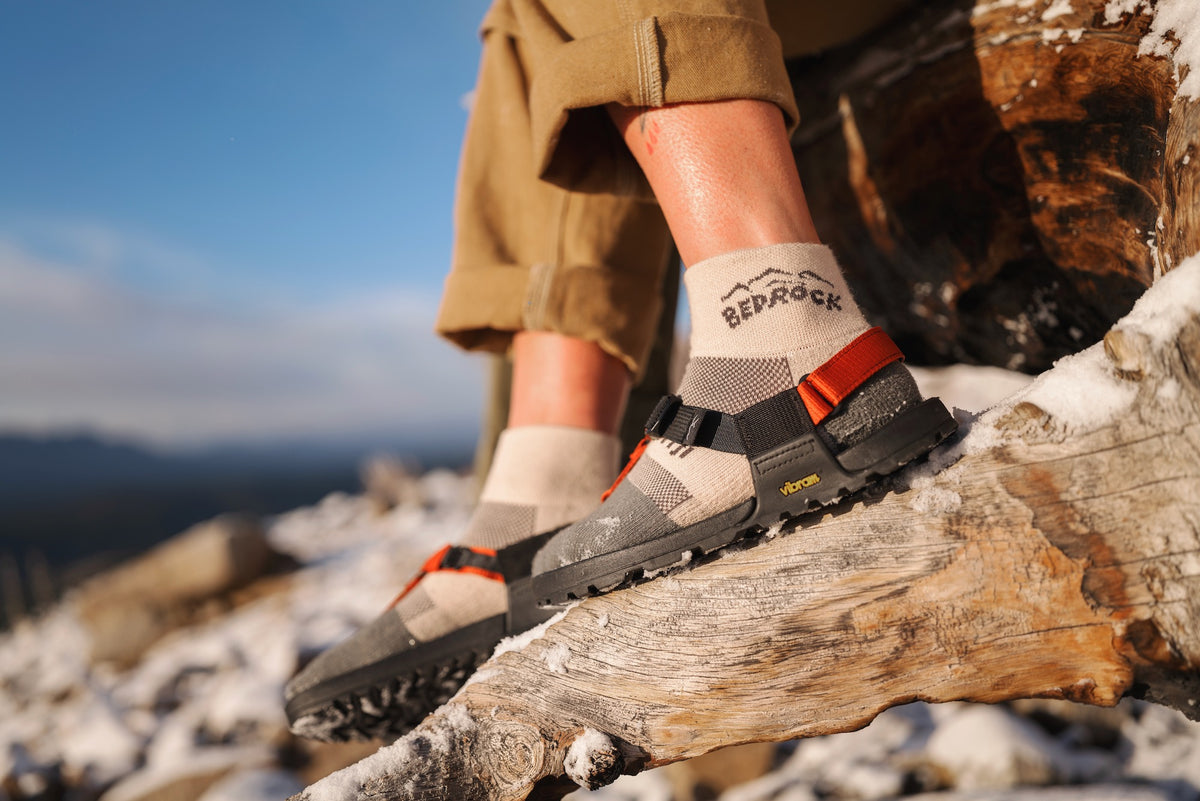 Person wearing Birch Split-Toe Bedrock Injinji Socks on Mountain